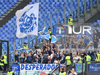 Supporters of Empoli F.C. attend the 7th day of the Serie A Championship between S.S. Lazio and Empoli F.C. at the Olympic Stadium in Rome,...