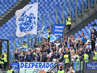 Supporters of Empoli F.C. attend the 7th day of the Serie A Championship between S.S. Lazio and Empoli F.C. at the Olympic Stadium in Rome,...