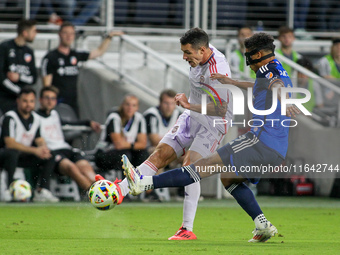 Orlando defender Kyle Smith takes a shot on goal during the Major League Soccer match between FC Cincinnati and Orlando City SC at TQL Stadi...