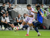 Orlando defender Kyle Smith takes a shot on goal during the Major League Soccer match between FC Cincinnati and Orlando City SC at TQL Stadi...