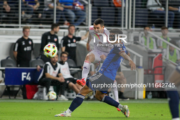 Orlando defender Kyle Smith takes a shot on goal during the Major League Soccer match between FC Cincinnati and Orlando City SC at TQL Stadi...