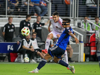 Orlando defender Kyle Smith takes a shot on goal during the Major League Soccer match between FC Cincinnati and Orlando City SC at TQL Stadi...