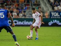 Orlando midfielder Wilder Cartagena appears during the Major League Soccer match between FC Cincinnati and Orlando City SC at TQL Stadium in...