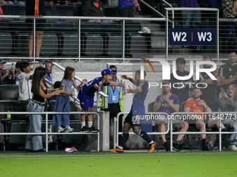 Cincinnati midfielder Luciano Acosta celebrates with his family after scoring a goal during the Major League Soccer match between FC Cincinn...