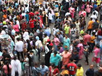 People shop at a crowded market ahead of the Durga Puja festival in Kolkata, India, on October 6, 2024. The annual Durga Puja festival, whic...