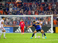 Cincinnati attacker Kevin Kelsy and Orlando defender Rodrigo Schlegel compete for the ball during the Major League Soccer match between FC C...