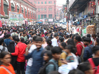 People shop at a crowded market ahead of the Durga Puja festival in Kolkata, India, on October 6, 2024. The annual Durga Puja festival, whic...