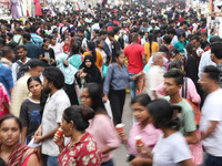 People shop at a crowded market ahead of the Durga Puja festival in Kolkata, India, on October 6, 2024. The annual Durga Puja festival, whic...