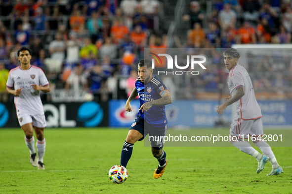 Cincinnati midfielder Luciano Acosta moves the ball upfield during the Major League Soccer match between FC Cincinnati and Orlando City SC a...