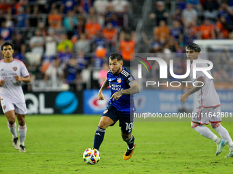 Cincinnati midfielder Luciano Acosta moves the ball upfield during the Major League Soccer match between FC Cincinnati and Orlando City SC a...