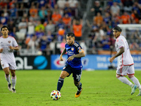 Cincinnati midfielder Luciano Acosta moves the ball upfield during the Major League Soccer match between FC Cincinnati and Orlando City SC a...