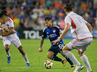 Cincinnati midfielder Luciano Acosta moves the ball upfield during the Major League Soccer match between FC Cincinnati and Orlando City SC a...