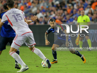 Cincinnati midfielder Luciano Acosta moves the ball upfield during the Major League Soccer match between FC Cincinnati and Orlando City SC a...