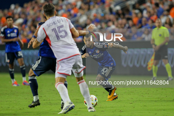 Cincinnati midfielder Luciano Acosta moves the ball upfield during the Major League Soccer match between FC Cincinnati and Orlando City SC a...