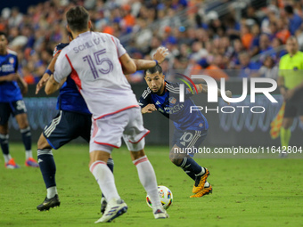 Cincinnati midfielder Luciano Acosta moves the ball upfield during the Major League Soccer match between FC Cincinnati and Orlando City SC a...