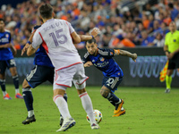 Cincinnati midfielder Luciano Acosta moves the ball upfield during the Major League Soccer match between FC Cincinnati and Orlando City SC a...