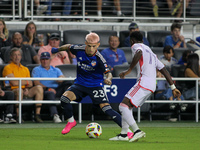 Cincinnati midfielder Luca Orellano moves the ball upfield during the Major League Soccer match between FC Cincinnati and Orlando City SC at...