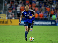 Cincinnati midfielder Yuya Kubo moves the ball upfield during the Major League Soccer match between FC Cincinnati and Orlando City SC at TQL...