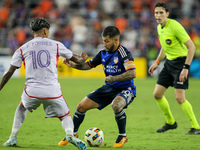 Cincinnati midfielder Luciano Acosta and Orlando midfielder Facundo Torres compete for the ball during the Major League Soccer match between...