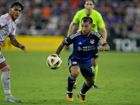 Cincinnati midfielder, Luciano Acosta, moves the ball upfield during the Major League Soccer match between FC Cincinnati and Orlando City SC...