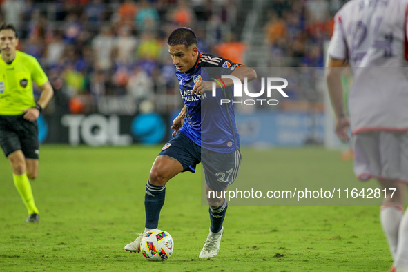 Cincinnati midfielder Yamil Asad moves the ball upfield during the Major League Soccer match between FC Cincinnati and Orlando City SC at TQ...