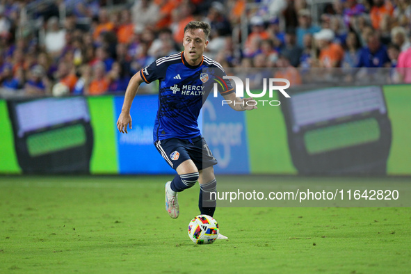 Cincinnati midfielder Corey Baird moves the ball upfield during the Major League Soccer match between FC Cincinnati and Orlando City SC at T...