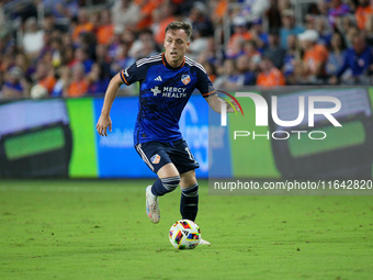 Cincinnati midfielder Corey Baird moves the ball upfield during the Major League Soccer match between FC Cincinnati and Orlando City SC at T...