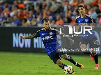 Cincinnati midfielder Luciano Acosta moves the ball upfield during the Major League Soccer match between FC Cincinnati and Orlando City SC a...