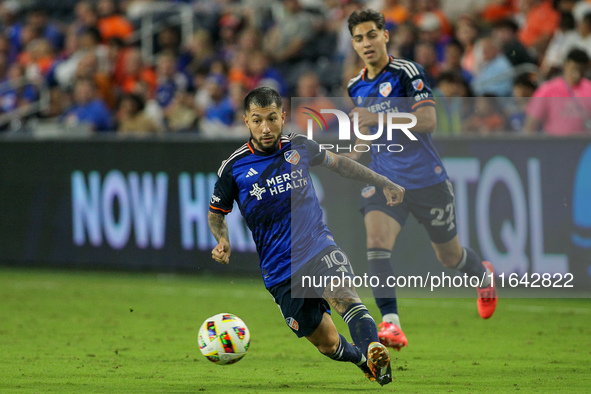 Cincinnati midfielder Luciano Acosta moves the ball upfield during the Major League Soccer match between FC Cincinnati and Orlando City SC a...