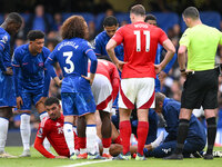 Morgan Gibbs-White of Nottingham Forest receives medical attention during the Premier League match between Chelsea and Nottingham Forest at...