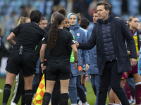 Manchester City W.F.C. manager Gareth Taylor shakes hands with the officials during the Barclays FA Women's Super League match between Manch...