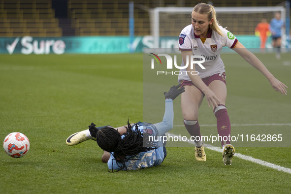 Khadija Shaw #21 of Manchester City W.F.C. is fouled by Shannon Cooke #21 of West Ham United F.C. during the Barclays FA Women's Super Leagu...