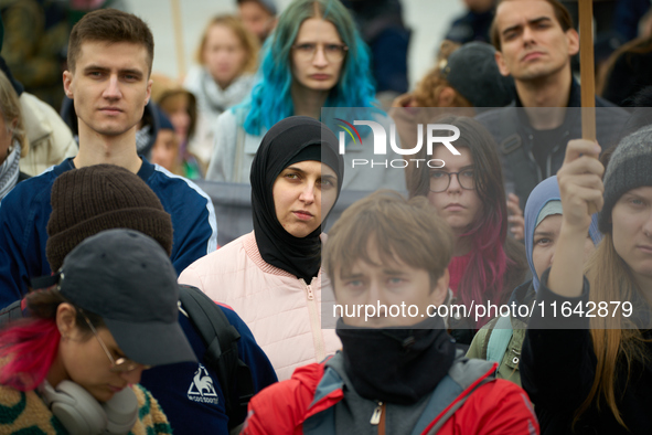 People take part in a rally in support of Palestine and Gaza in Warsaw, Poland on 05 October, 2024. About a hundred people marched from the...