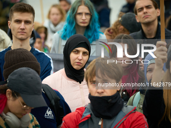 People take part in a rally in support of Palestine and Gaza in Warsaw, Poland on 05 October, 2024. About a hundred people marched from the...