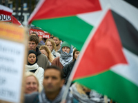 People take part in a rally in support of Palestine and Gaza in Warsaw, Poland on 05 October, 2024. About a hundred people marched from the...