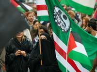 A woman wearing a burqa is seen during a rally in support of Palestine in Warsaw, Poland on 05 October, 2024. About a hundred people marched...