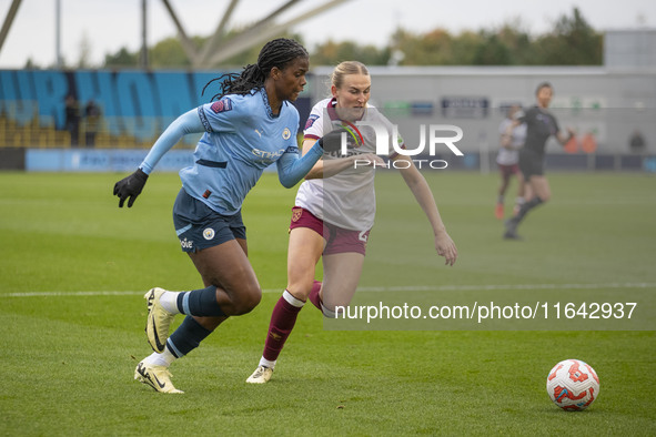 Khadija Shaw #21 of Manchester City W.F.C. is in action during the Barclays FA Women's Super League match between Manchester City and West H...