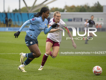 Khadija Shaw #21 of Manchester City W.F.C. is in action during the Barclays FA Women's Super League match between Manchester City and West H...