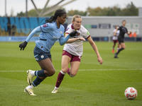 Khadija Shaw #21 of Manchester City W.F.C. is in action during the Barclays FA Women's Super League match between Manchester City and West H...