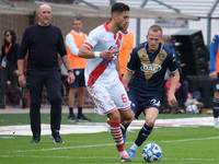 Cristiano Bani of Mantova 1911 contrasts with Lorenzo Dickman of Brescia Calcio FC during the Italian Serie B soccer championship football m...