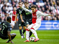 AFC Ajax Amsterdam forward Mika Godts plays during the match between Ajax and Groningen at the Johan Cruijff ArenA for the Dutch Eredivisie...