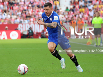 Alex Berenguer plays during the match between Girona FC and Athletic Club, corresponding to week 9 of LaLiga EA Sport, at the Montilivi Stad...