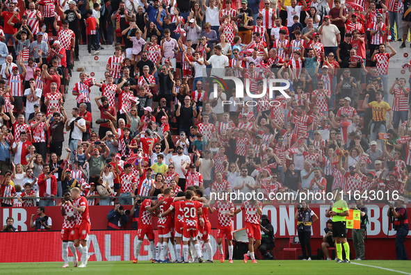 Girona players celebrate a goal during the match between Girona FC and Athletic Club, corresponding to week 9 of LaLiga EA Sport, at the Mon...