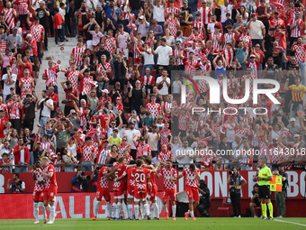 Girona players celebrate a goal during the match between Girona FC and Athletic Club, corresponding to week 9 of LaLiga EA Sport, at the Mon...