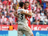 Paulo Gazzaniga and Cristhian Stuani celebrate during the match between Girona FC and Athletic Club in week 9 of LaLiga EA Sport at the Mont...