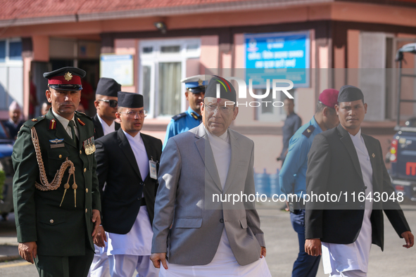 Nepal's new Chief Justice Prakashman Singh Raut (Center) arrives at the Supreme Court premises to take charge of office in Kathmandu, Nepal,...