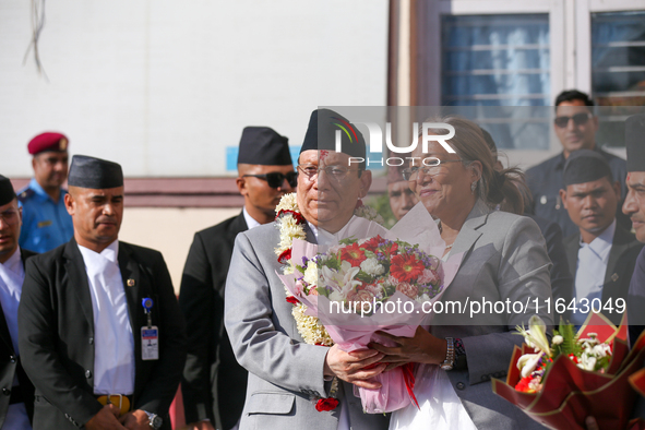 Nepal's new Chief Justice Prakashman Singh Raut (center) is welcomed by Supreme Court justices upon his arrival at the Supreme Court premise...