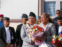 Nepal's new Chief Justice Prakashman Singh Raut (center) is welcomed by Supreme Court justices upon his arrival at the Supreme Court premise...