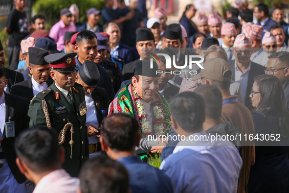 Nepal's new Chief Justice Prakashman Singh Raut is welcomed by Supreme Court justices and officials upon his arrival at the Supreme Court pr...