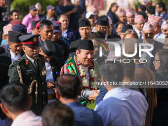 Nepal's new Chief Justice Prakashman Singh Raut is welcomed by Supreme Court justices and officials upon his arrival at the Supreme Court pr...